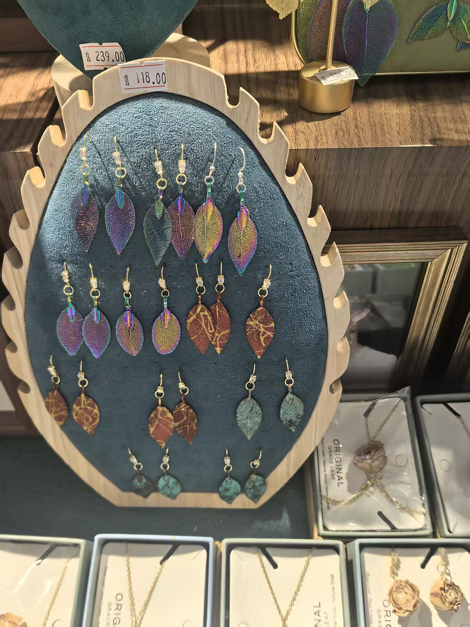 Real display board of colorful natural leaf earrings
