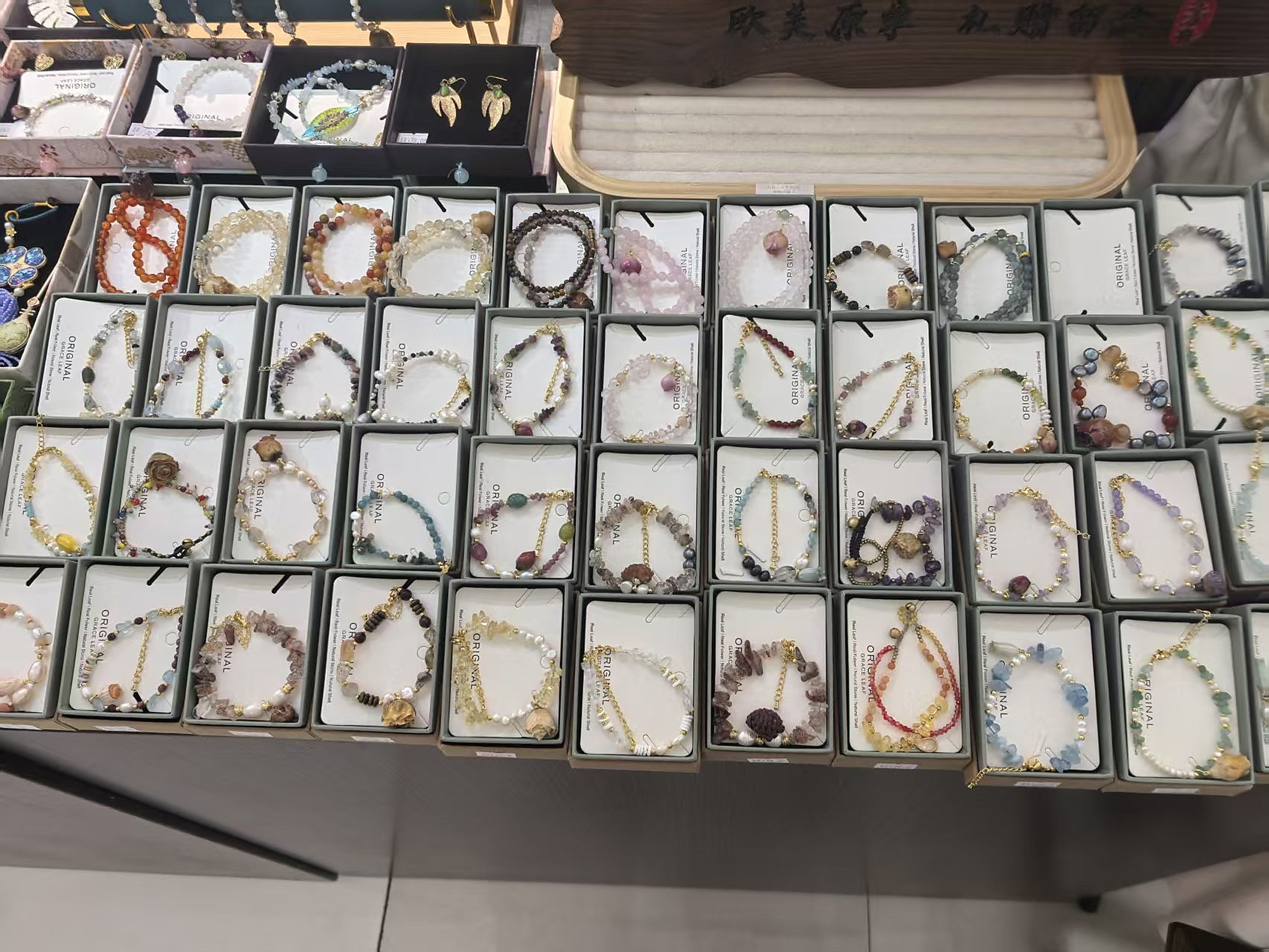 Real boxed crystal bracelets arranged for wholesale selection